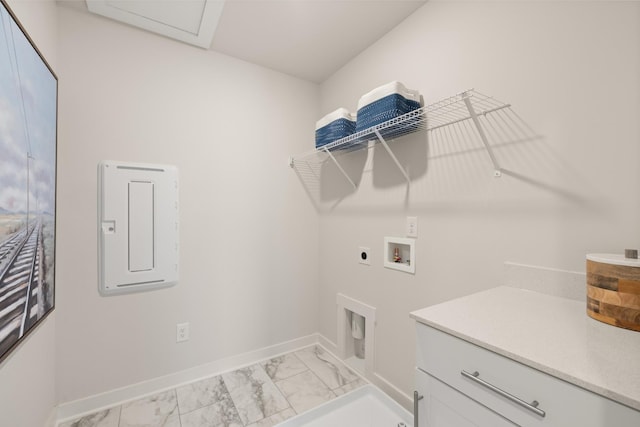 1243 Tucker Dr, Lebanon, TN 37087 - washroom featuring hookup for an electric dryer, light marble finish flooring, washer hookup, and cabinet space