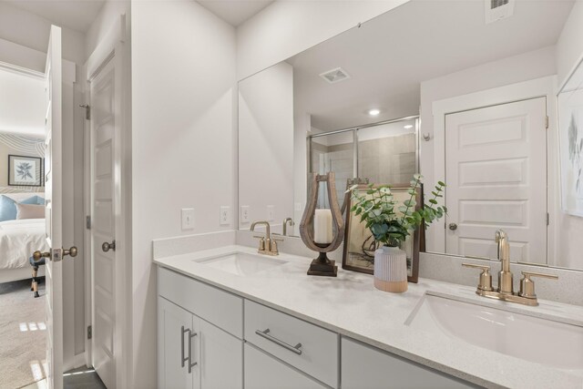 1243 Tucker Dr, Lebanon, TN 37087 - ensuite bathroom with double vanity, a shower stall, and recessed lighting