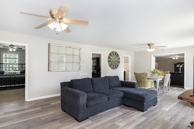 5519 Noble King Rd, Franklin, TN 37064 - living area with light wood-style flooring and a ceiling fan