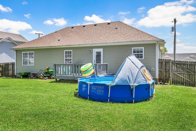 1338 Loren Cir, Clarksville, TN 37042 - back of house featuring a deck and roof with shingles