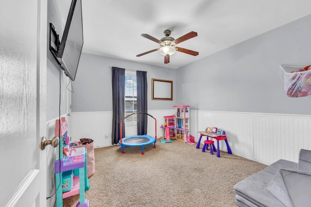 1338 Loren Cir, Clarksville, TN 37042 - recreation room with a ceiling fan, a wainscoted wall, and carpet flooring
