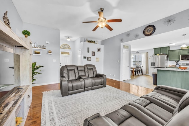 1338 Loren Cir, Clarksville, TN 37042 - living area with a ceiling fan and light wood-style floors