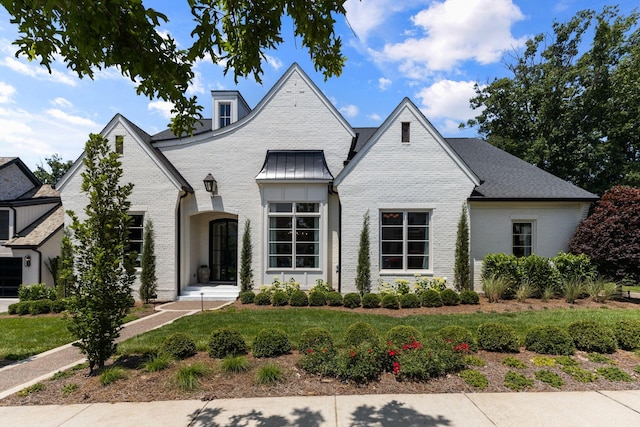 7318 Harlow Dr, College Grove, TN 37046 - view of front of house with brick siding and a front yard