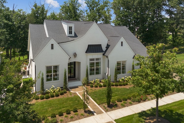 7318 Harlow Dr, College Grove, TN 37046 - french country inspired facade featuring a front lawn, a standing seam roof, brick siding, a shingled roof, and a metal roof