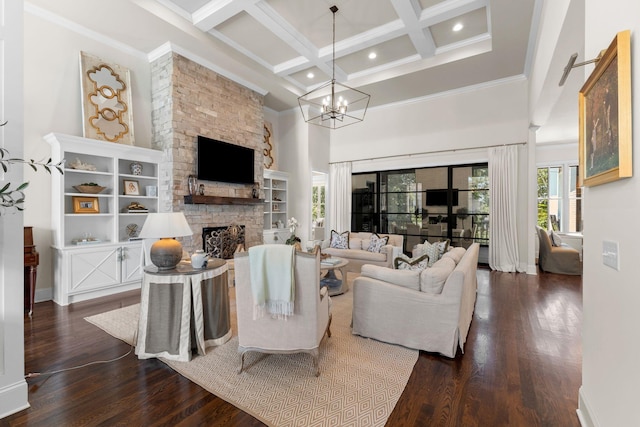 7318 Harlow Dr, College Grove, TN 37046 - living room with beamed ceiling, a fireplace, coffered ceiling, crown molding, and dark wood-type flooring