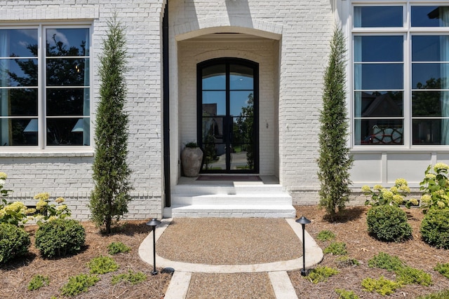 7318 Harlow Dr, College Grove, TN 37046 - doorway to property with brick siding
