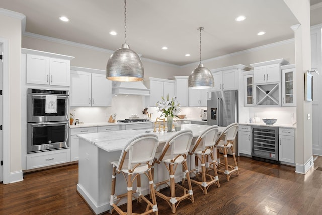 7318 Harlow Dr, College Grove, TN 37046 - kitchen featuring beverage cooler, stainless steel appliances, a kitchen island with sink, dark wood-style flooring, and recessed lighting