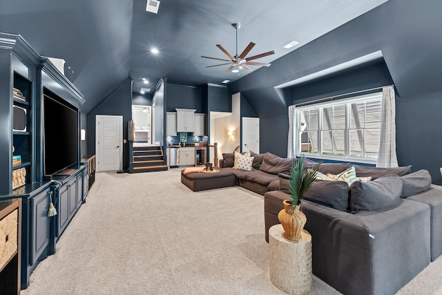 7318 Harlow Dr, College Grove, TN 37046 - living area with ceiling fan, lofted ceiling, light carpet, and stairs
