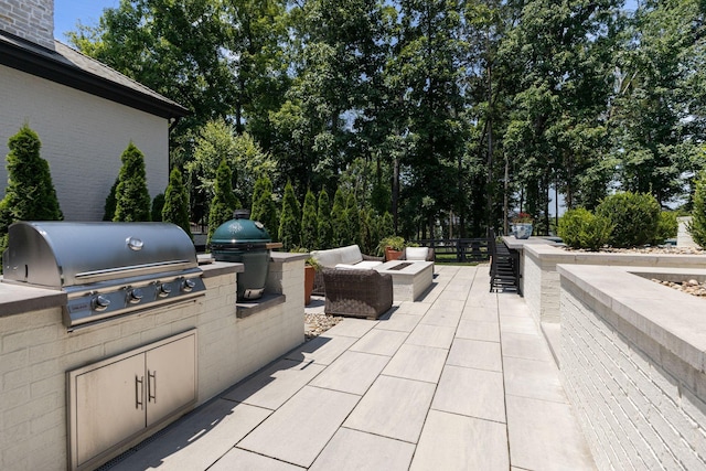 7318 Harlow Dr, College Grove, TN 37046 - view of patio with area for grilling and an outdoor living space
