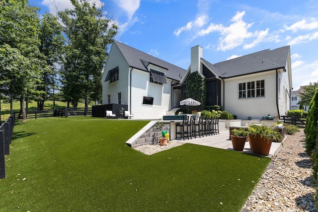 7318 Harlow Dr, College Grove, TN 37046 - back of house with a patio and a chimney