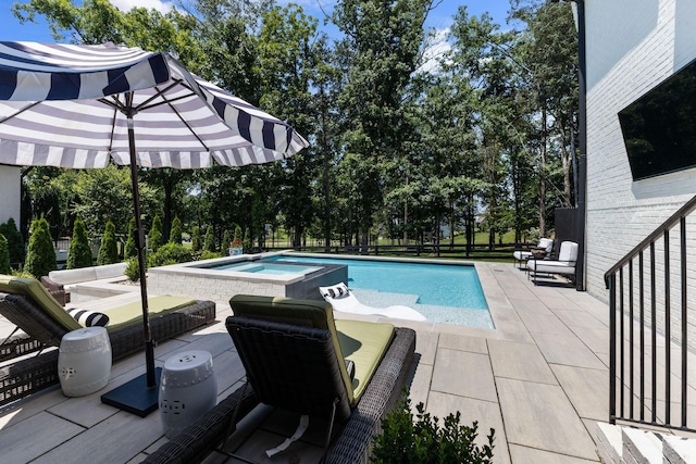 7318 Harlow Dr, College Grove, TN 37046 - view of pool featuring a patio, view of scattered trees, and a pool with connected hot tub