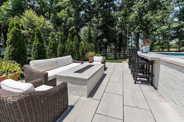7318 Harlow Dr, College Grove, TN 37046 - view of patio / terrace with an outdoor living space with a fire pit