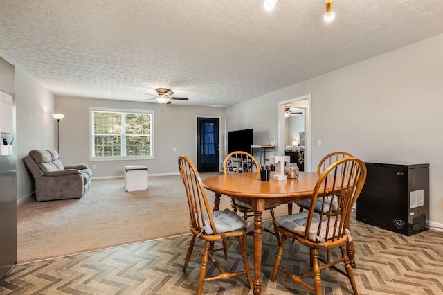 183 Caydras Way, Lafayette, TN 37083 - dining room featuring a ceiling fan, a textured ceiling, and light carpet