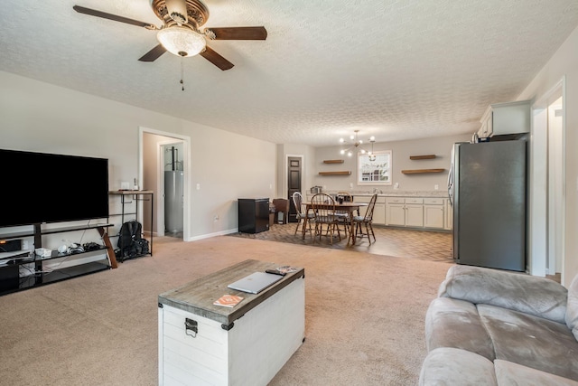 183 Caydras Way, Lafayette, TN 37083 - living area with light colored carpet, a textured ceiling, ceiling fan, and a chandelier