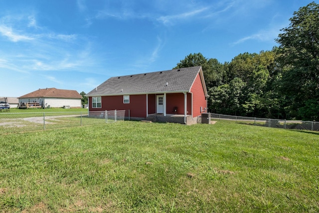 183 Caydras Way, Lafayette, TN 37083 - rear view of house with a shingled roof and a fenced backyard