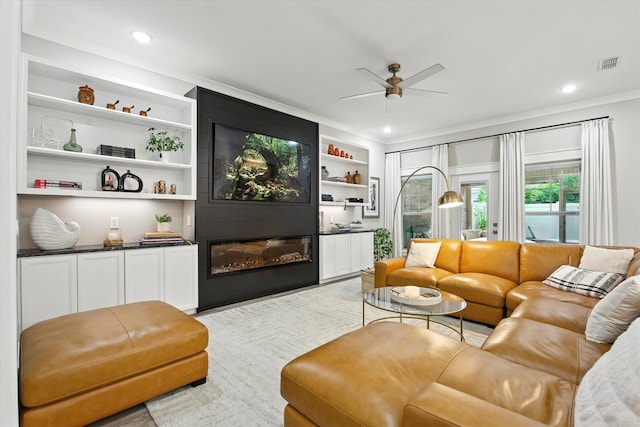 2135 Halfmoon Way, Murfreesboro, TN 37130 - living room with crown molding, a ceiling fan, a large fireplace, and recessed lighting