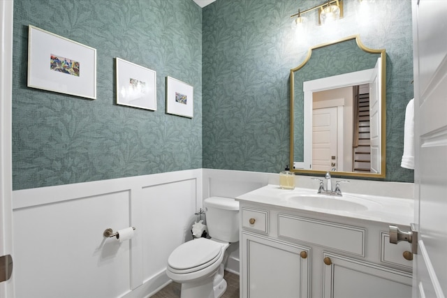 2135 Halfmoon Way, Murfreesboro, TN 37130 - half bath featuring vanity, a wainscoted wall, and wallpapered walls