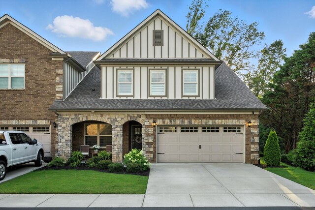 2135 Halfmoon Way, Murfreesboro, TN 37130 - view of front facade featuring board and batten siding, driveway, a porch, and roof with shingles