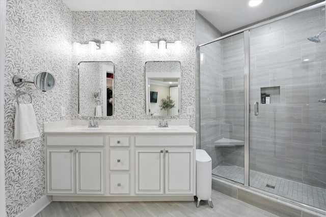 2135 Halfmoon Way, Murfreesboro, TN 37130 - bathroom with a stall shower, double vanity, and wallpapered walls