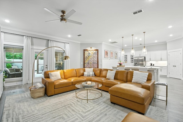 2135 Halfmoon Way, Murfreesboro, TN 37130 - living area featuring crown molding, ceiling fan, recessed lighting, and light wood-type flooring