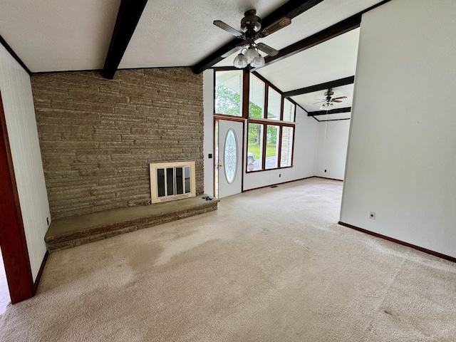 1039 Old Martha Washngton Rd, Clarkrange, TN 38553 - unfurnished living room with ceiling fan, carpet, and a large fireplace