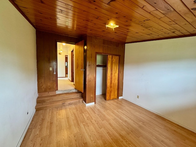 1039 Old Martha Washngton Rd, Clarkrange, TN 38553 - empty room featuring wooden ceiling, light wood finished floors, and wooden walls