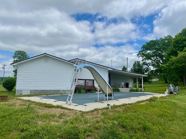1039 Old Martha Washngton Rd, Clarkrange, TN 38553 - back of property with a yard and crawl space