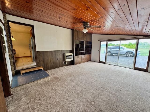 1039 Old Martha Washngton Rd, Clarkrange, TN 38553 - unfurnished living room with wood ceiling, heating unit, wooden walls, carpet floors, and a ceiling fan