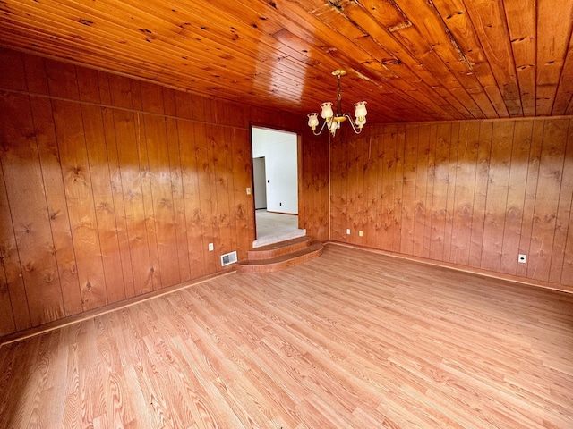 1039 Old Martha Washngton Rd, Clarkrange, TN 38553 - unfurnished room with wood finished floors, a chandelier, wood ceiling, and wooden walls