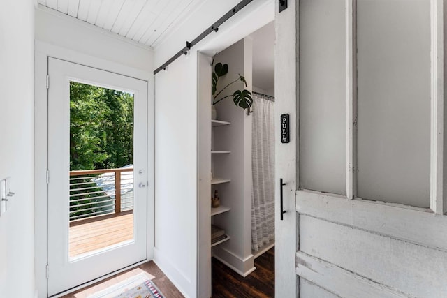 1418 Ridge Rd, Dickson, TN 37055 - doorway to outside featuring healthy amount of natural light, a barn door, and wood finished floors