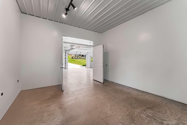 1418 Ridge Rd, Dickson, TN 37055 - spare room featuring finished concrete floors