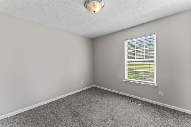 232 Elmwood Dr, Murfreesboro, TN 37128 - carpeted empty room with a textured ceiling