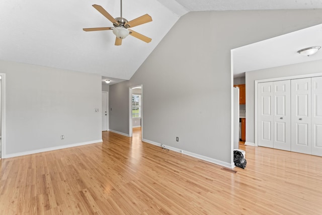 232 Elmwood Dr, Murfreesboro, TN 37128 - unfurnished living room featuring high vaulted ceiling, a ceiling fan, and light wood-style flooring