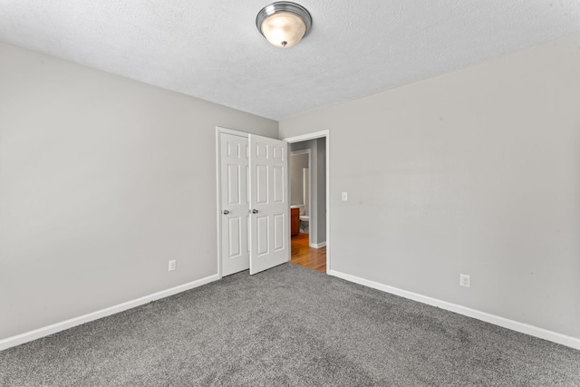 232 Elmwood Dr, Murfreesboro, TN 37128 - carpeted spare room featuring baseboards and a textured ceiling