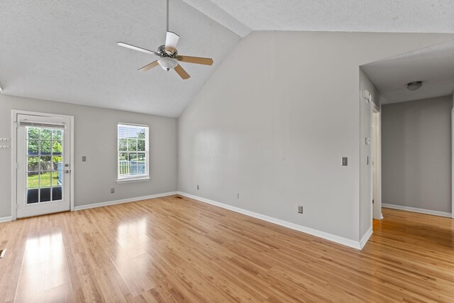 232 Elmwood Dr, Murfreesboro, TN 37128 - unfurnished living room featuring ceiling fan, light wood-type flooring, a textured ceiling, and high vaulted ceiling