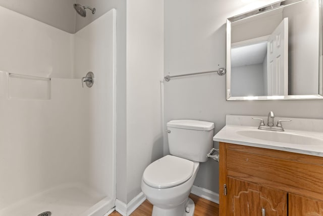 232 Elmwood Dr, Murfreesboro, TN 37128 - full bathroom with a shower, vanity, and wood finished floors