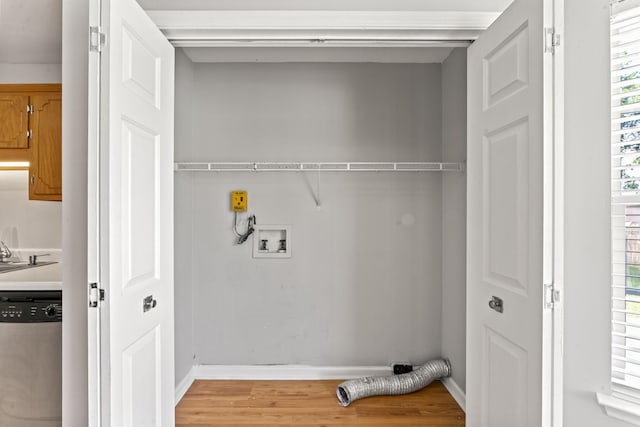 232 Elmwood Dr, Murfreesboro, TN 37128 - laundry area with light wood-style flooring and washer hookup