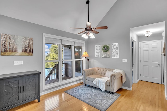 268 Crest Dr, Lynchburg, TN 37352 - living room featuring a ceiling fan, light wood-style flooring, and high vaulted ceiling