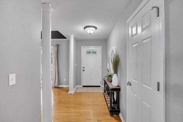 268 Crest Dr, Lynchburg, TN 37352 - entrance foyer featuring decorative columns and light wood finished floors