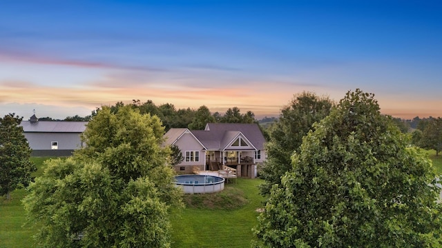 268 Crest Dr, Lynchburg, TN 37352 - rear view of property featuring an outdoor pool and a yard