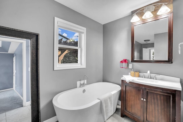 268 Crest Dr, Lynchburg, TN 37352 - full bathroom featuring vanity, a freestanding tub, and tile patterned floors