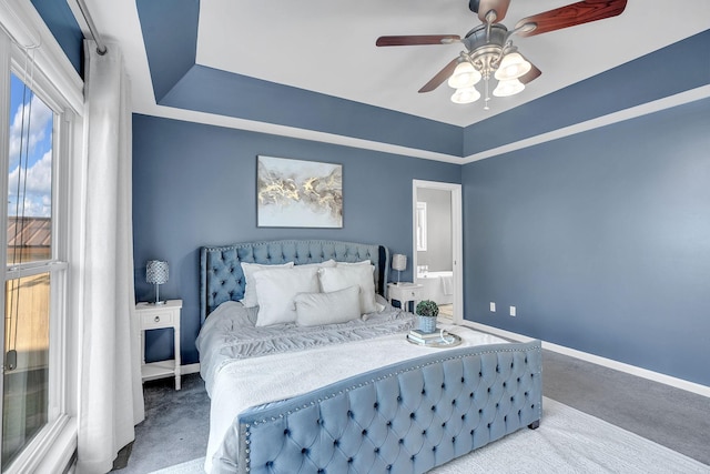 268 Crest Dr, Lynchburg, TN 37352 - bedroom with a ceiling fan, carpet flooring, and a raised ceiling