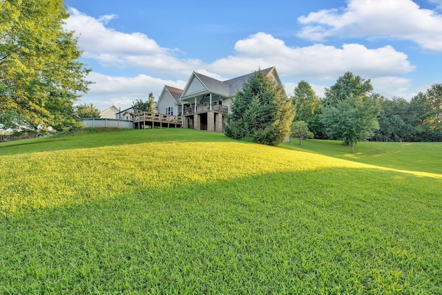 268 Crest Dr, Lynchburg, TN 37352 - view of green lawn with a deck
