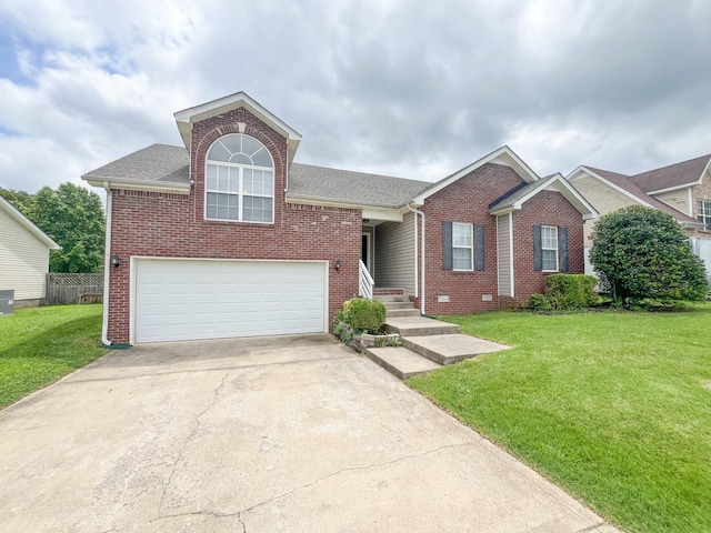 2763 Ridgepole Dr, Clarksville, TN 37040 - view of front of property with brick siding, driveway, and roof with shingles