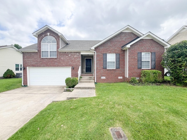 2763 Ridgepole Dr, Clarksville, TN 37040 - view of front of house featuring brick siding, concrete driveway, and a front lawn