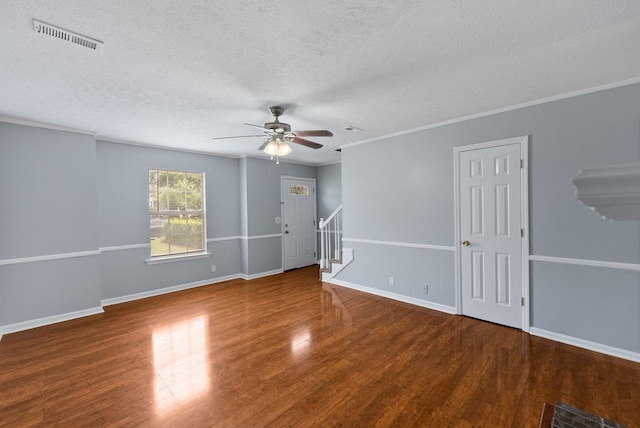 3357 Oak Trees Ct, Antioch, TN 37013 - spare room with a textured ceiling, wood finished floors, a ceiling fan, stairway, and ornamental molding
