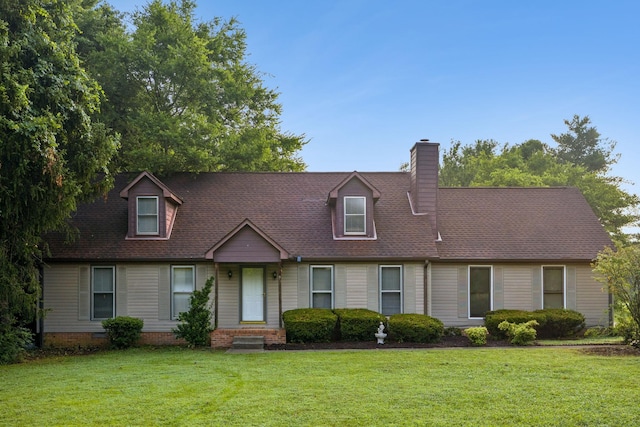 4651 Cynthia Ln, Murfreesboro, TN 37127 - new england style home featuring a front lawn, a chimney, and roof with shingles
