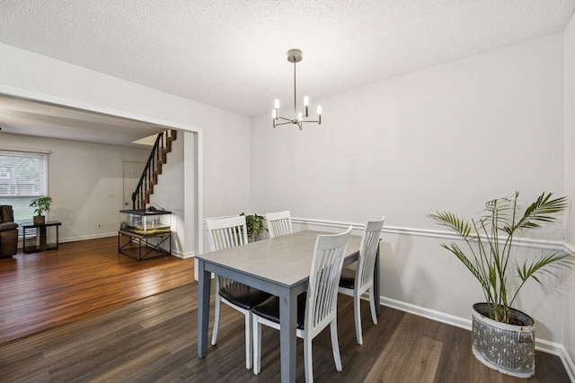 4651 Cynthia Ln, Murfreesboro, TN 37127 - dining space featuring wood finished floors, stairs, a chandelier, and a textured ceiling