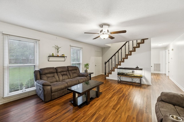 4651 Cynthia Ln, Murfreesboro, TN 37127 - living area with ceiling fan, stairs, healthy amount of natural light, and a textured ceiling