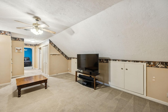 4651 Cynthia Ln, Murfreesboro, TN 37127 - additional living space with a textured ceiling, a ceiling fan, light colored carpet, and vaulted ceiling